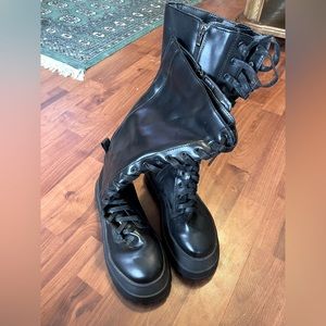 Knee high punk platform boots lace up and zip up. Size 8 US
